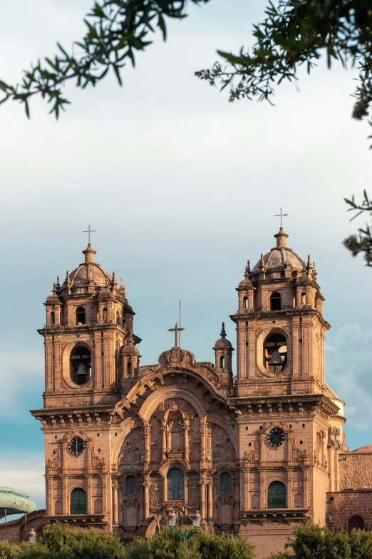 an old building with two spires on top of it