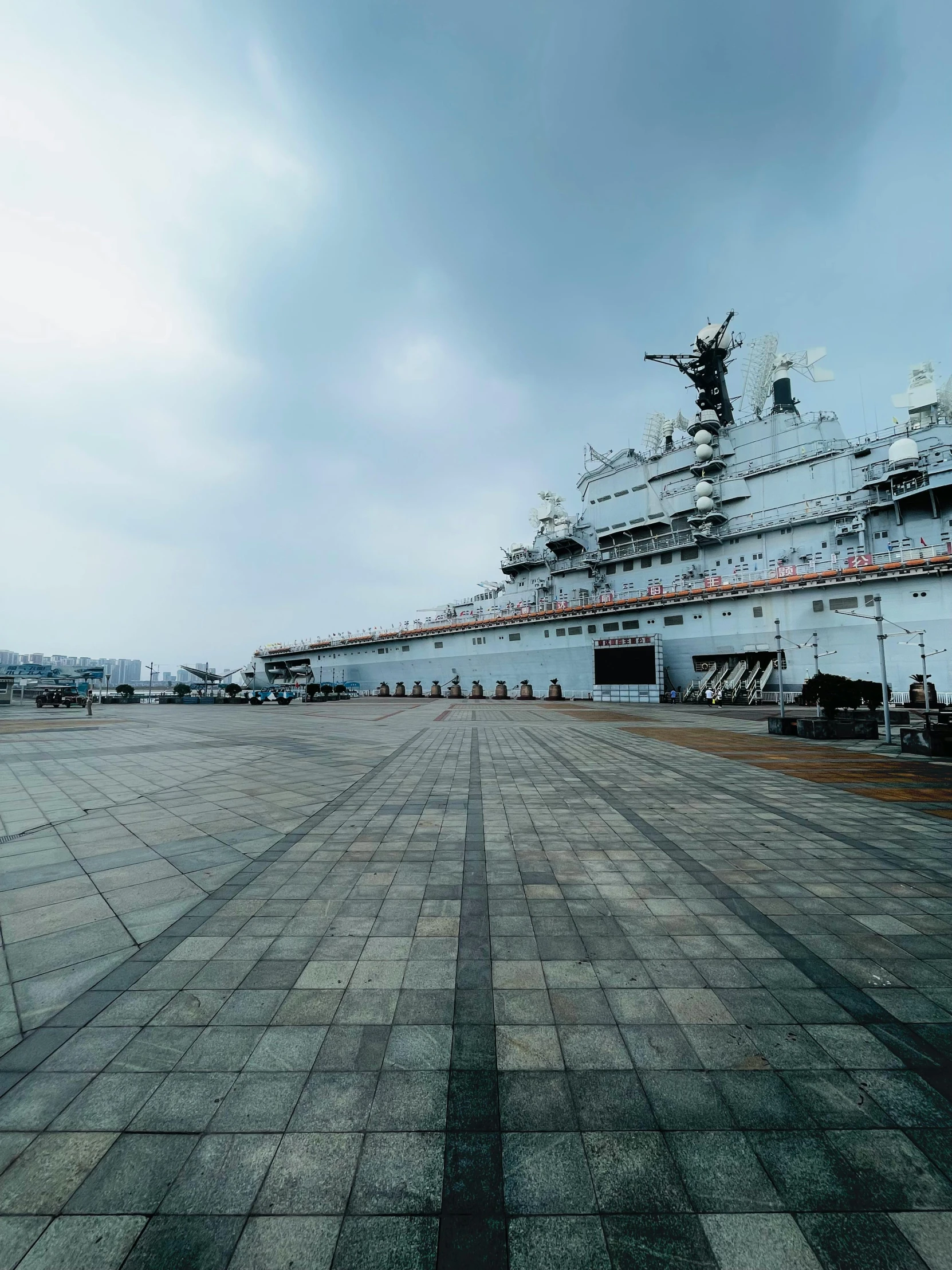 a large ship sitting in a parking lot