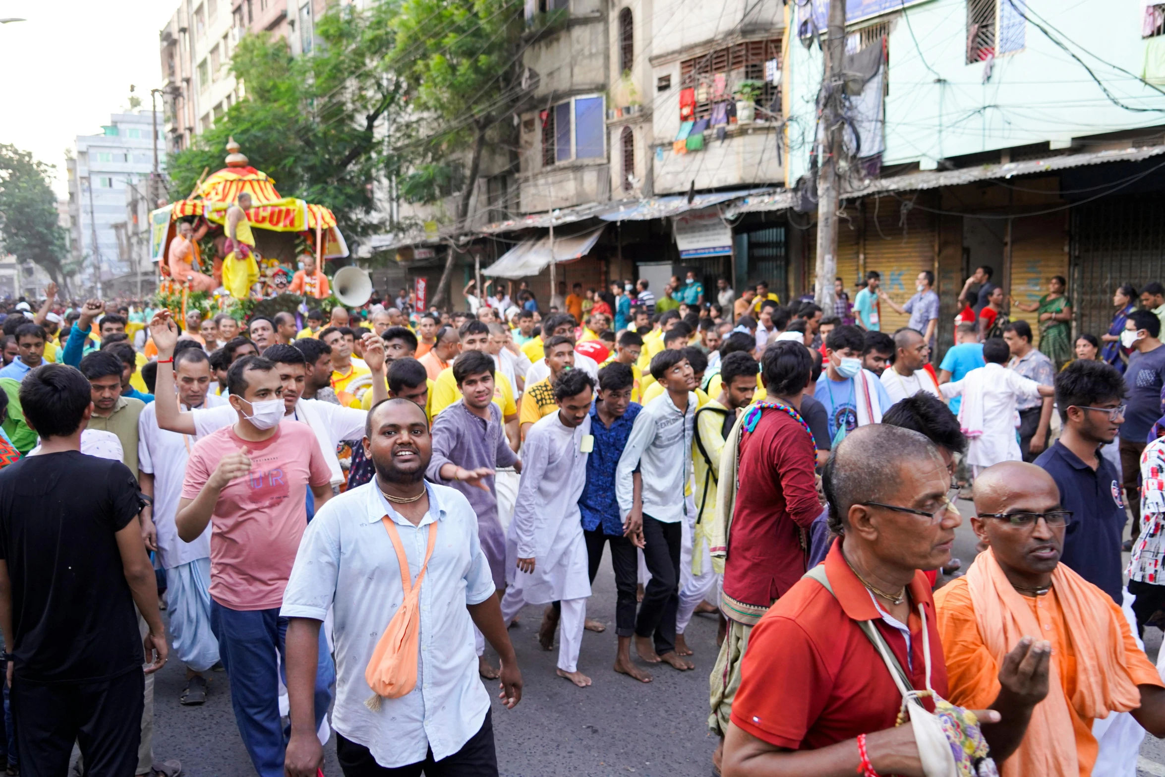 the people are marching in the street together