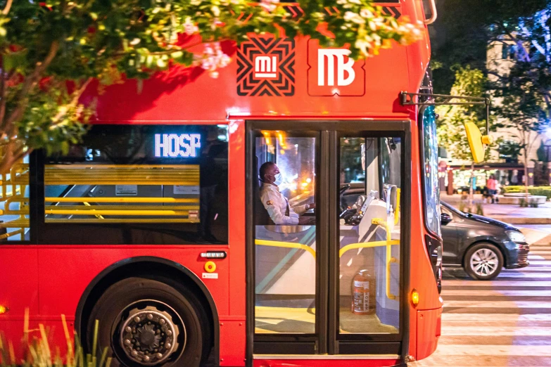 the city bus is stopped on the side of the street