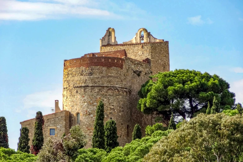 an old brick castle with a tower on top