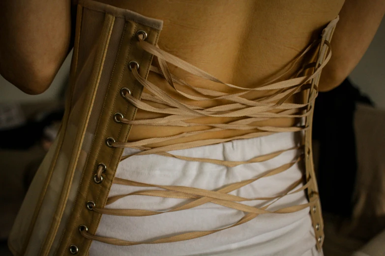 a close up s of a woman with a corset
