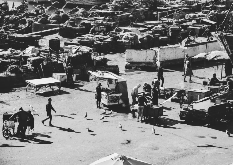 a black and white po of a construction zone with lots of tents