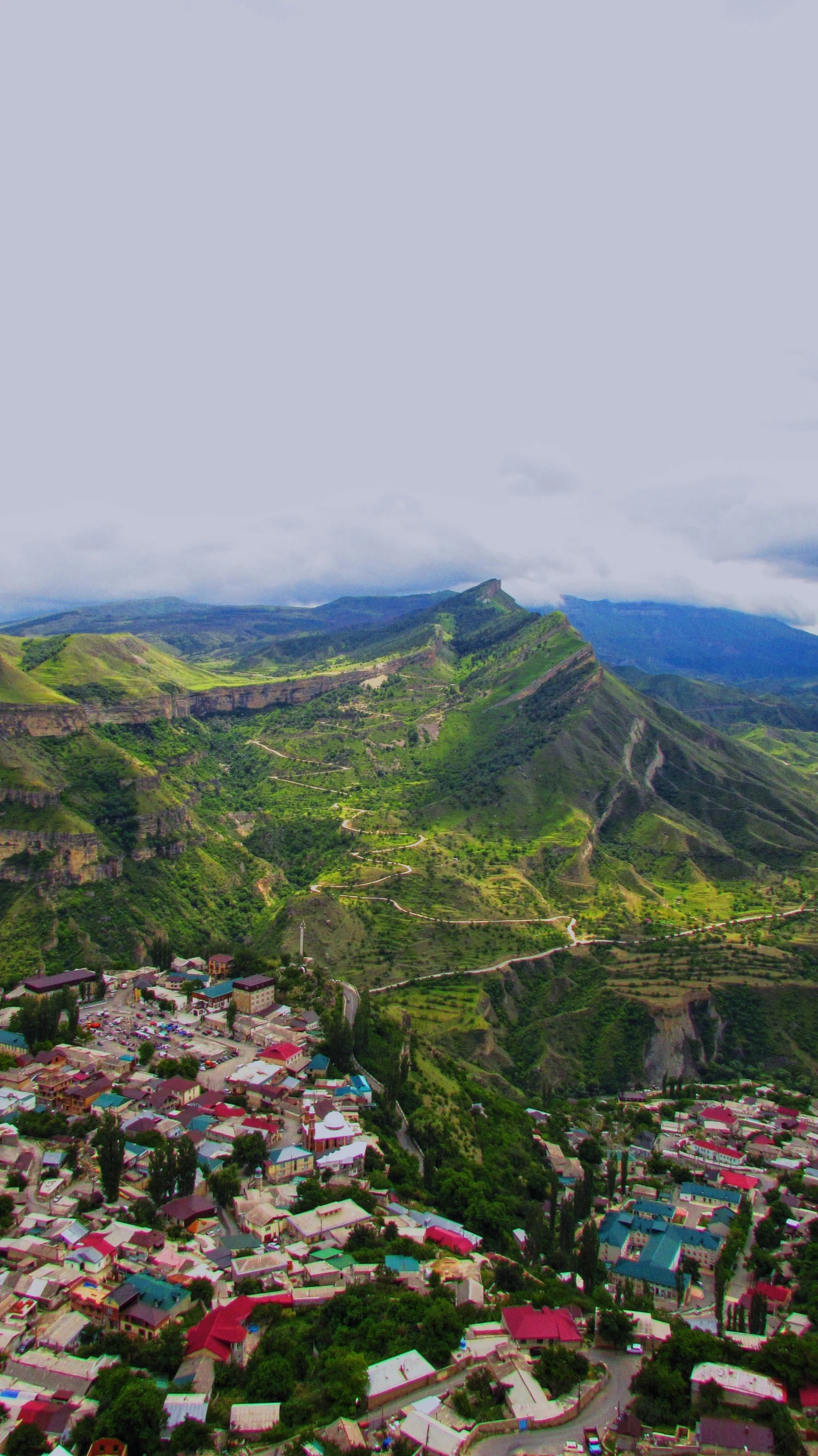 a bird's - eye view of some mountain side town