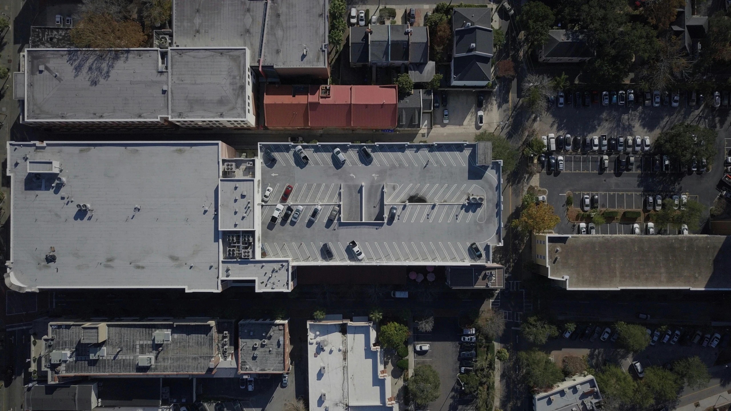 an aerial s of a building and parking lot