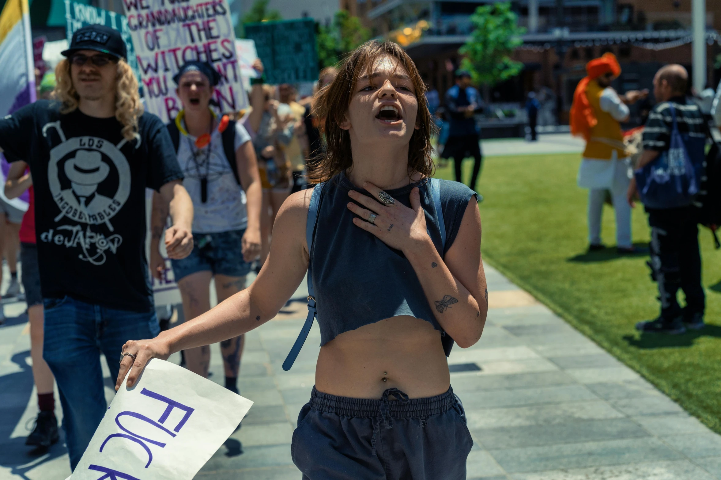 young people in protest at the end of a sidewalk