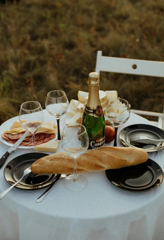 a bottle of wine sitting on top of a table