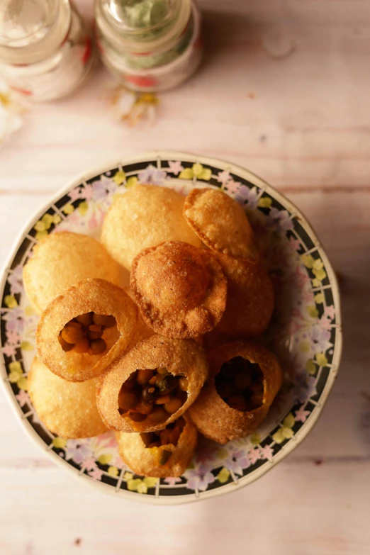 a white plate topped with a pile of dough