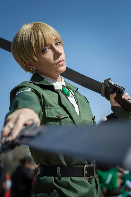 woman with blonde hair holding up giant metal swords