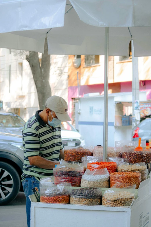 a man is making packages in his store