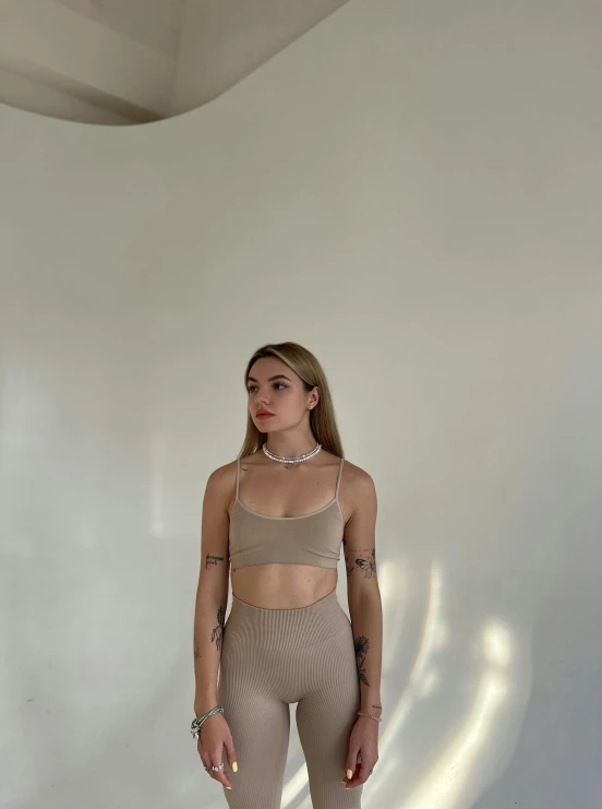 an image of a girl posing in an empty room