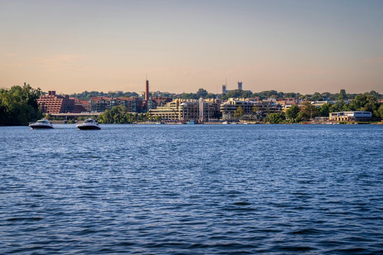 there are three boats out on the water