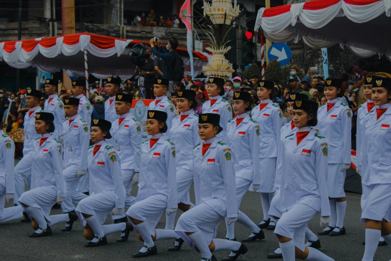 a group of people on the street during a parade