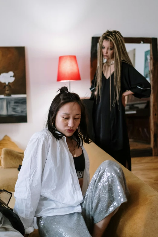 a woman getting ready for her prom gown