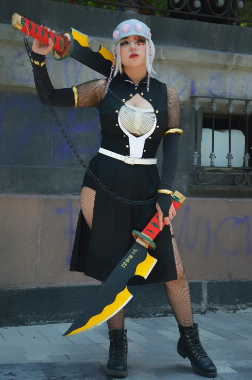 woman dressed in costume and holding sword on a street