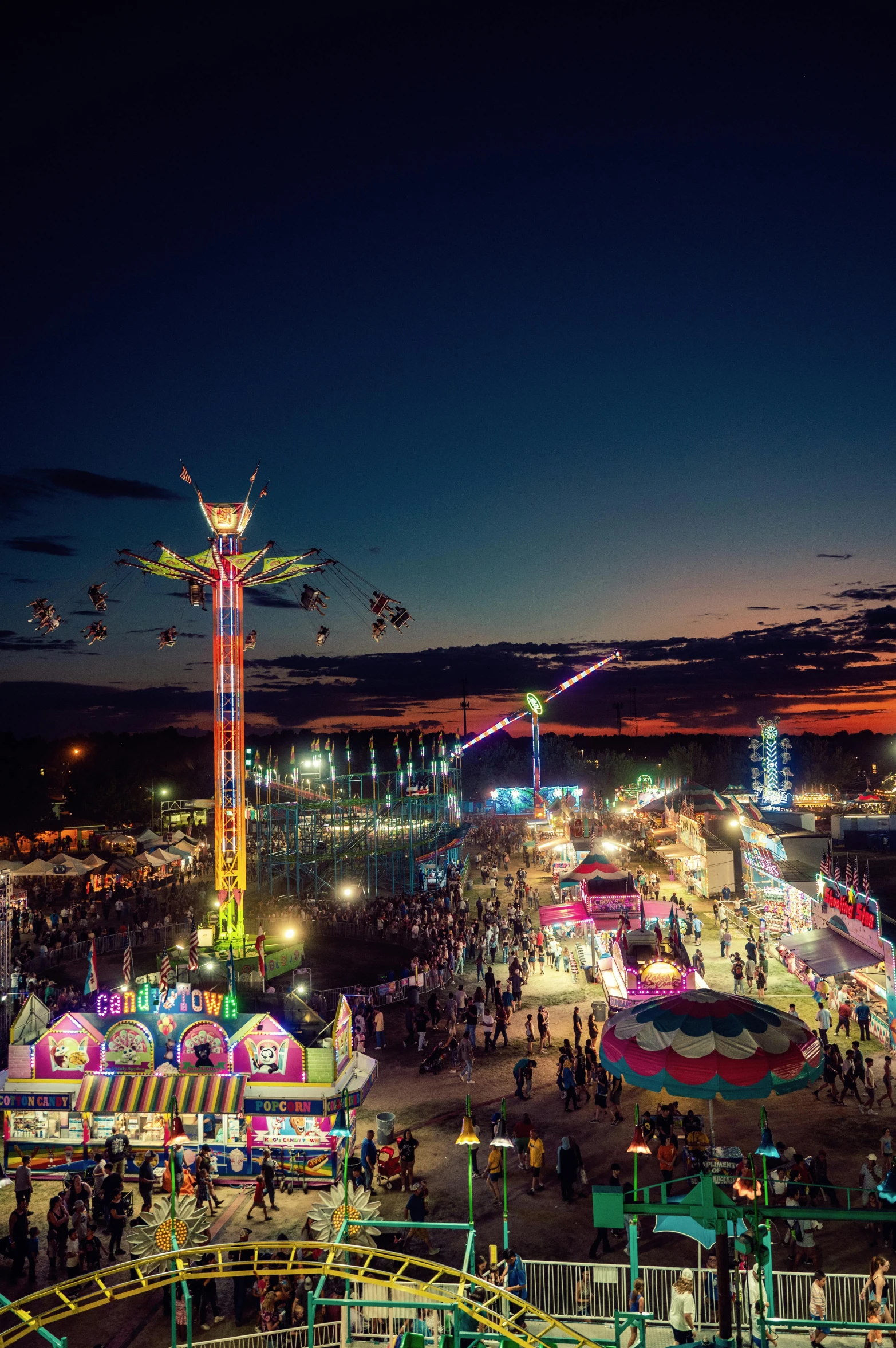 carnival rides, carousels, and rides at night with lights