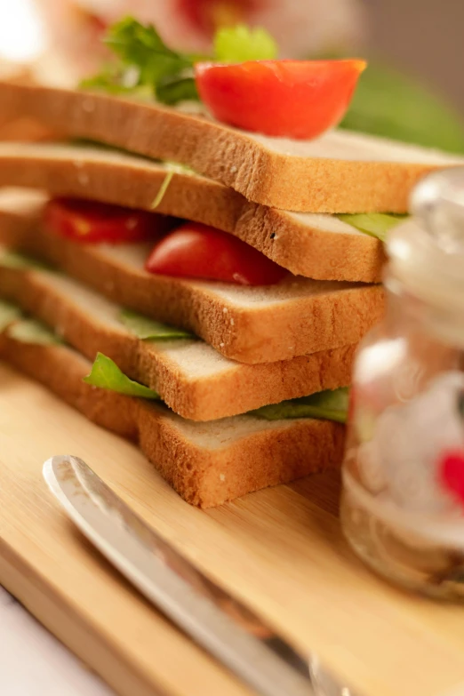 a close up of slices of bread with vegetables on it