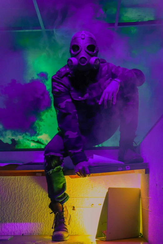 a person in gas mask sitting on a table