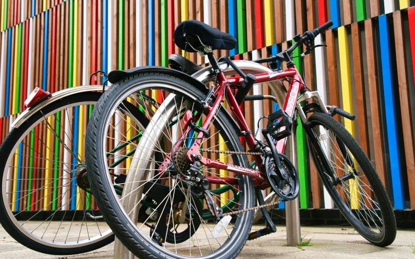 two bicycle are parked next to each other