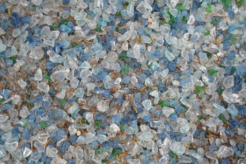 a close up of glass chips on the ground