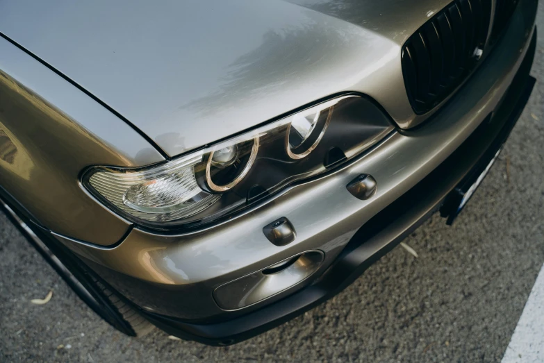 the front view of an automobile on the road