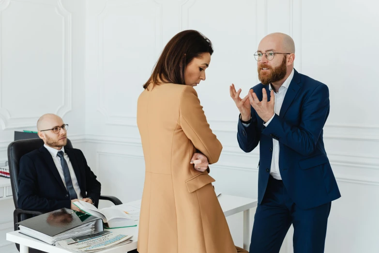 a man and woman are standing next to each other