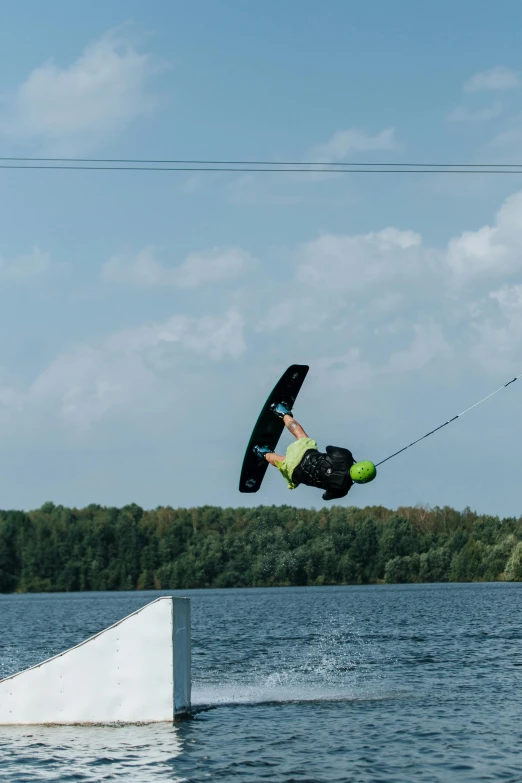 someone on a wakeboard is being pulled by a boat