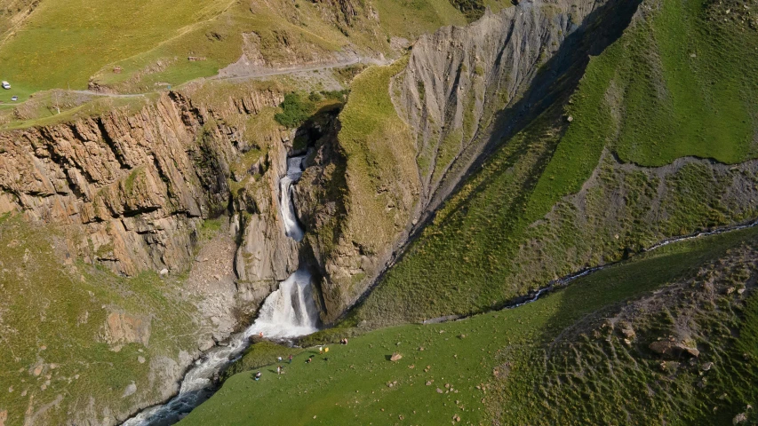 a waterfall flowing down the side of a cliff