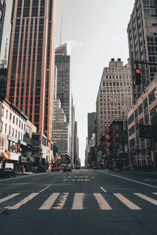 a traffic light on an empty city street