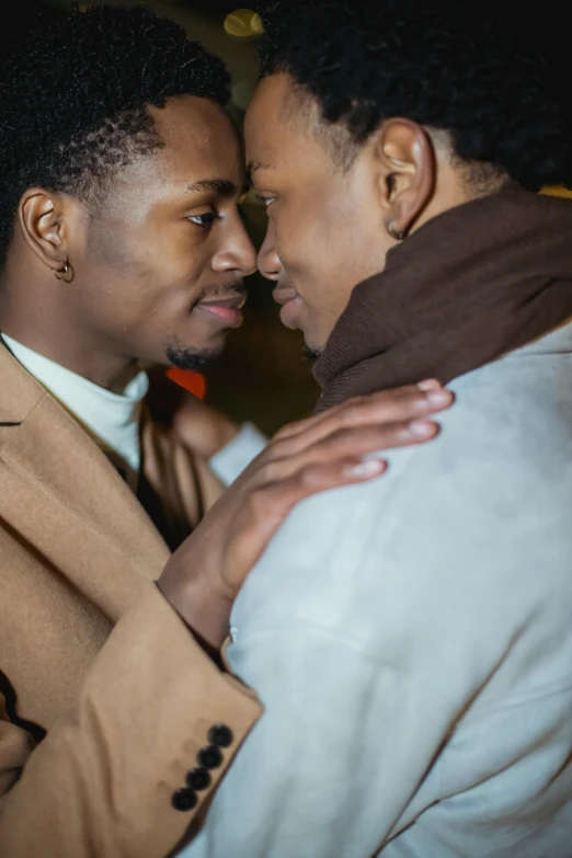 a man and woman emcing each other in a hug