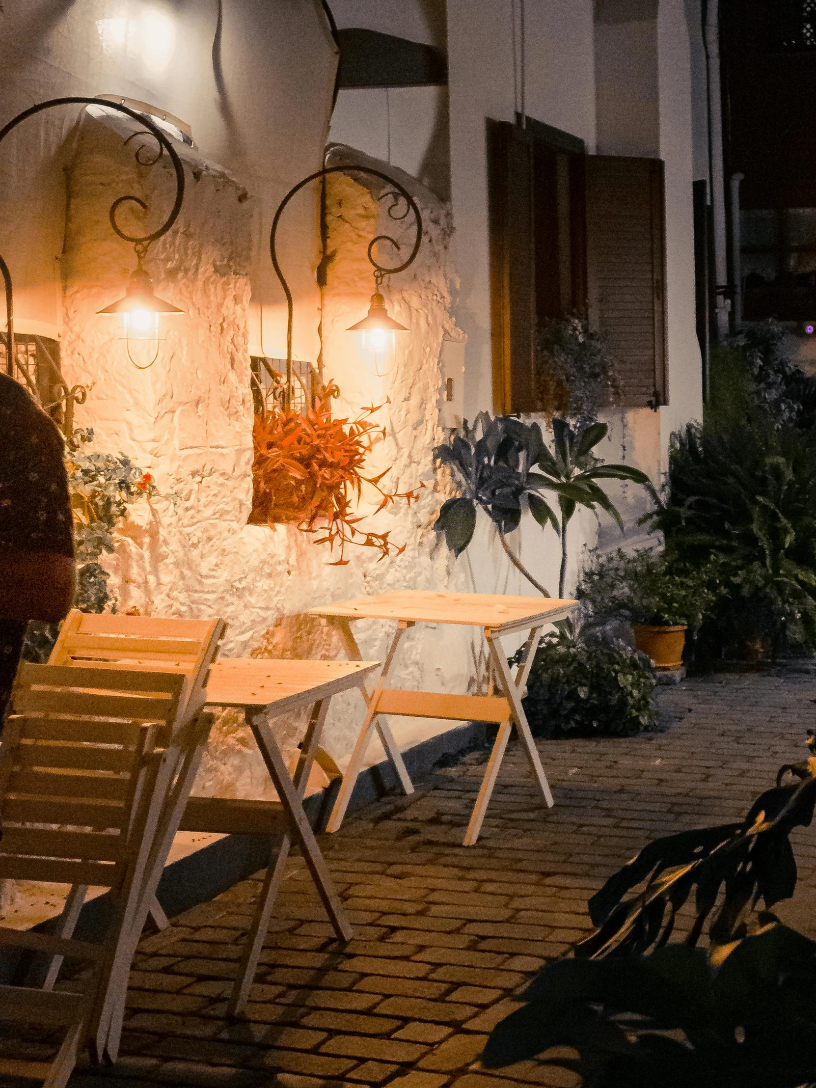 a night time pograph of an outside seating area