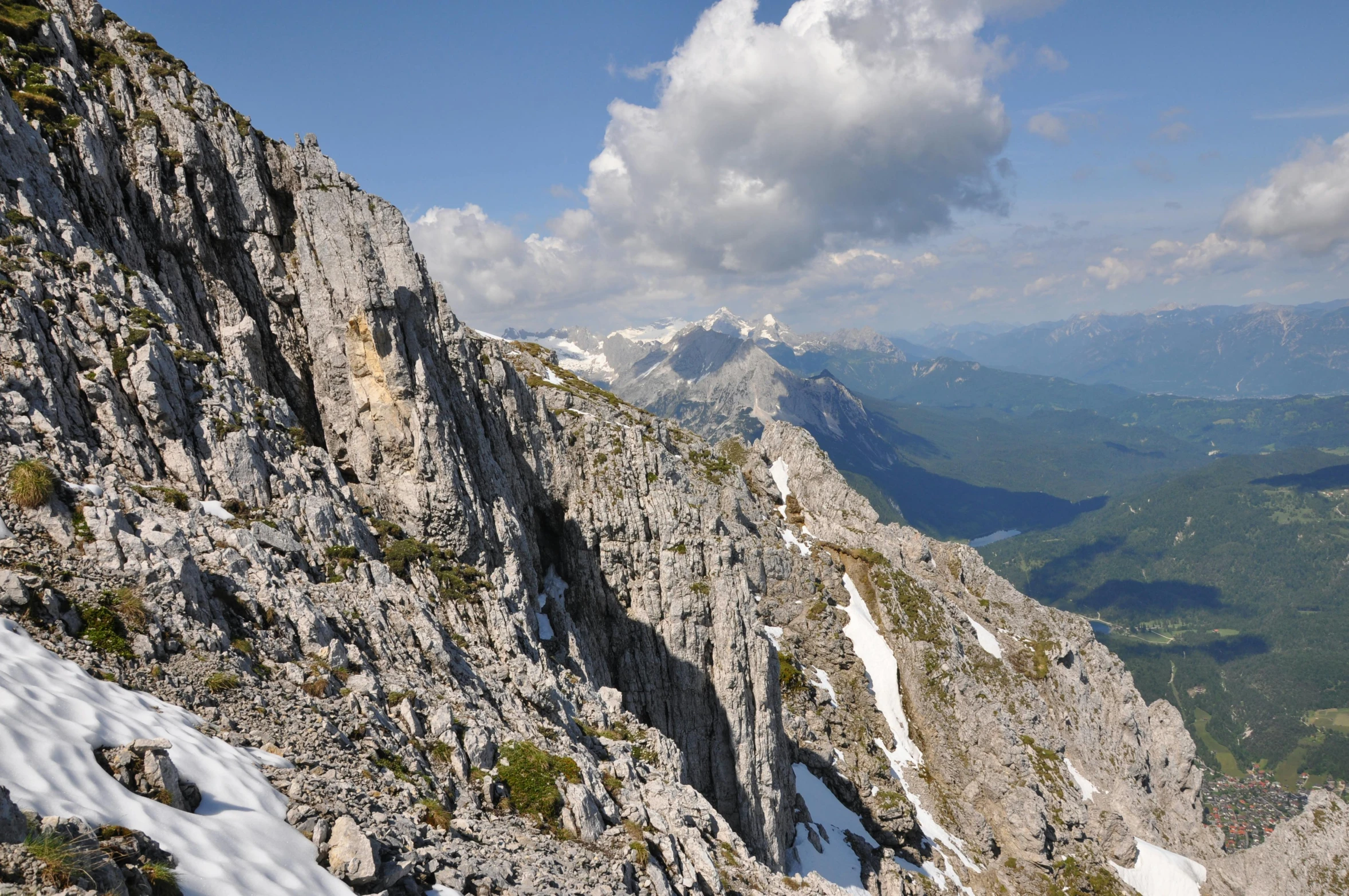 a view of the tops of mountains and valleys