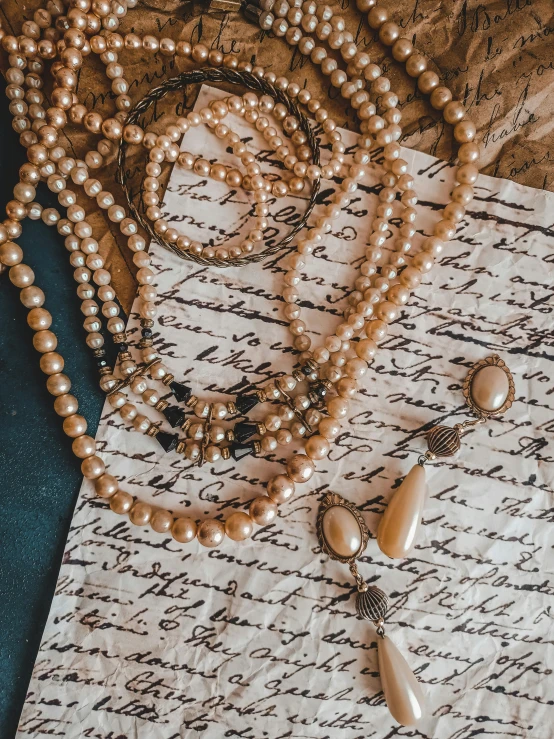 a table with pearls and other objects on it