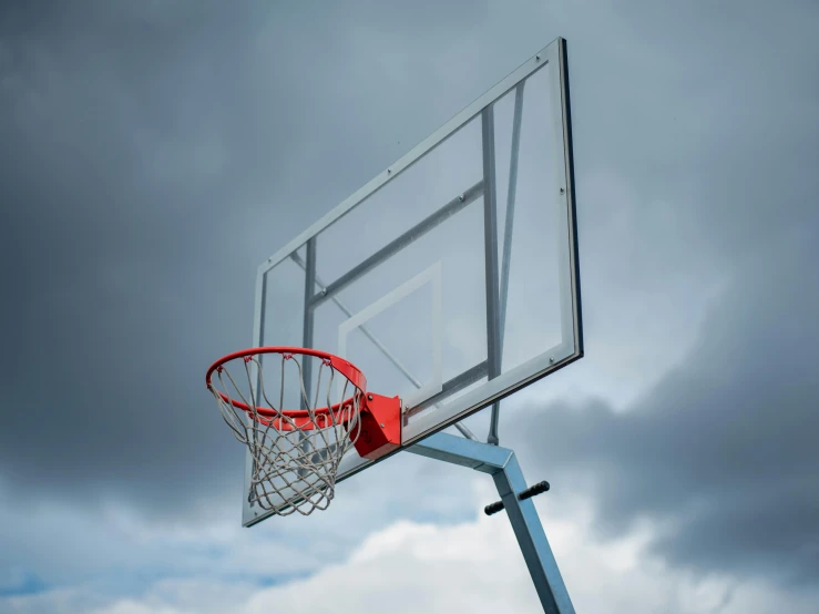 an empty basketball hoop with its back basket extended up