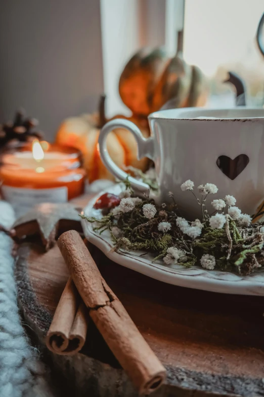 a cup sitting on top of a plate