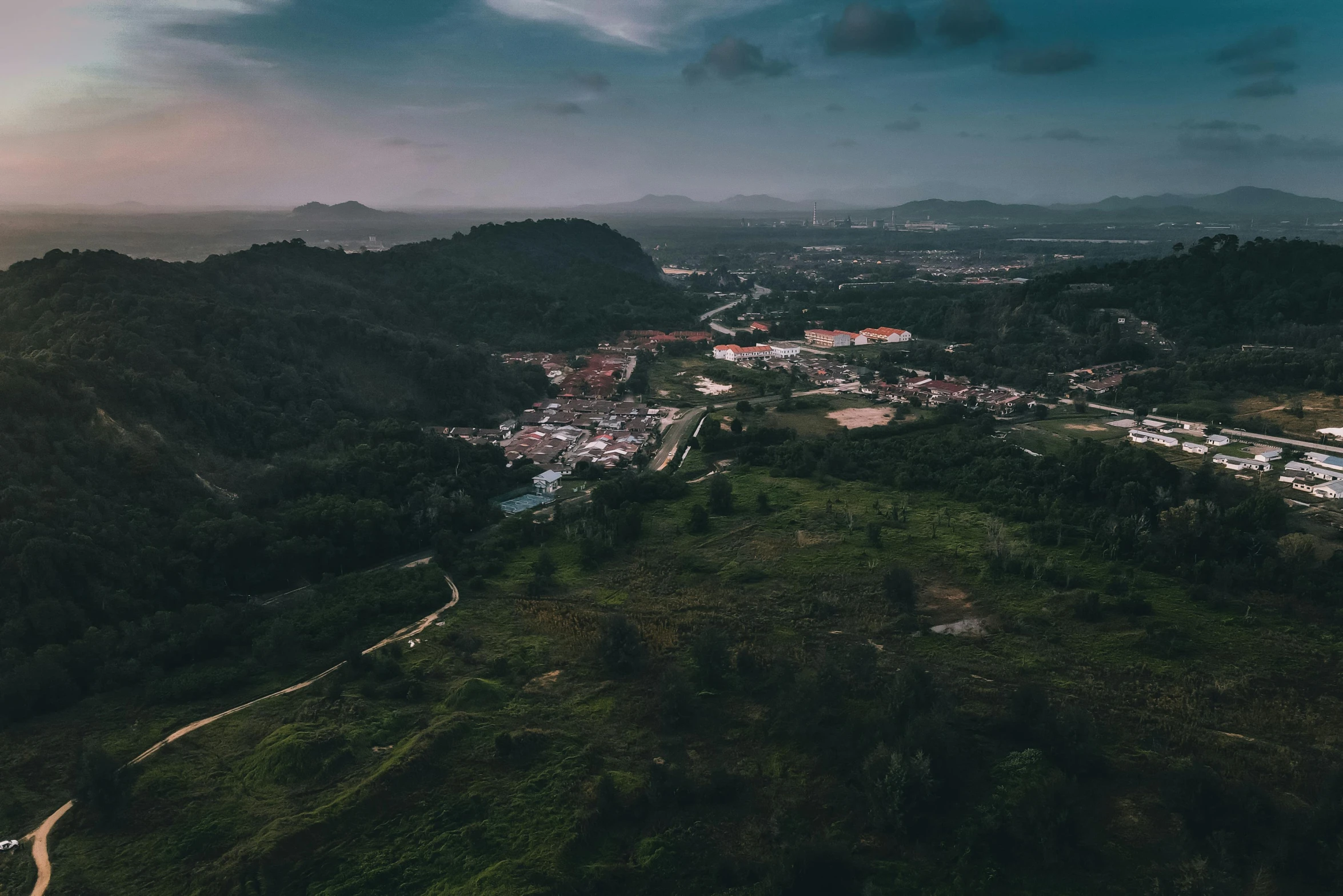 a scenic view from the air of a town in the mountains