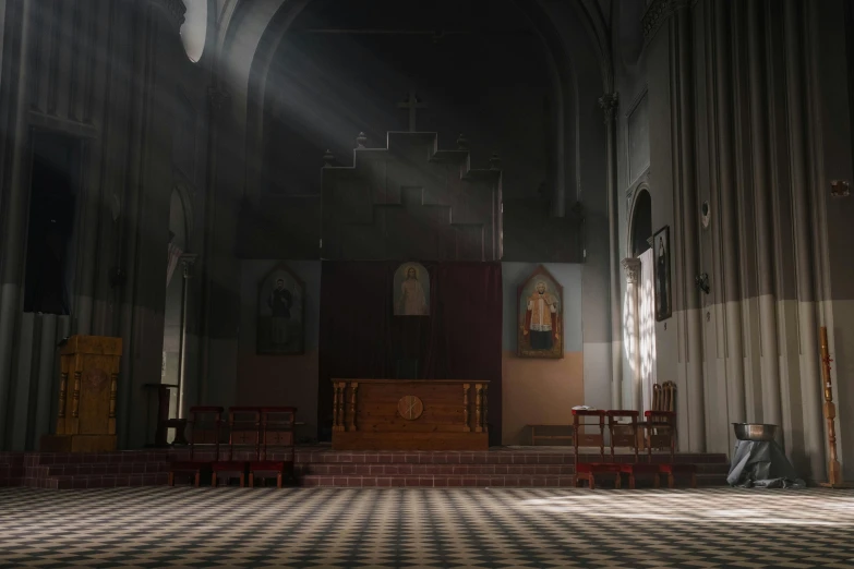a sunlight shines into a church with pews