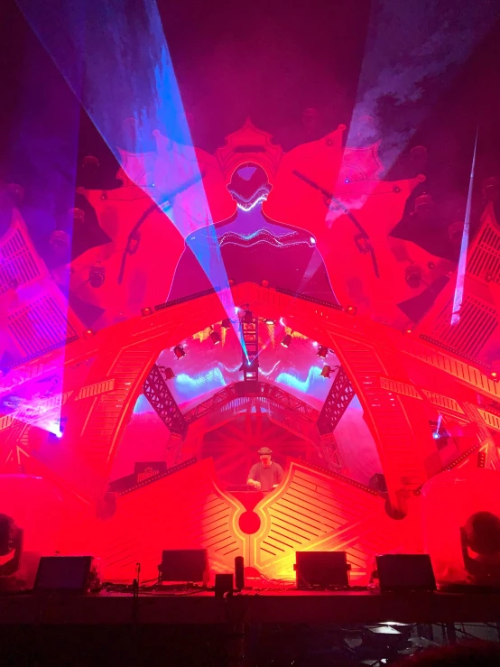 stage lighting is seen at a concert in a futuristic space