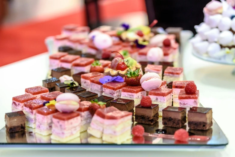 desserts on display, arranged for display, on white table