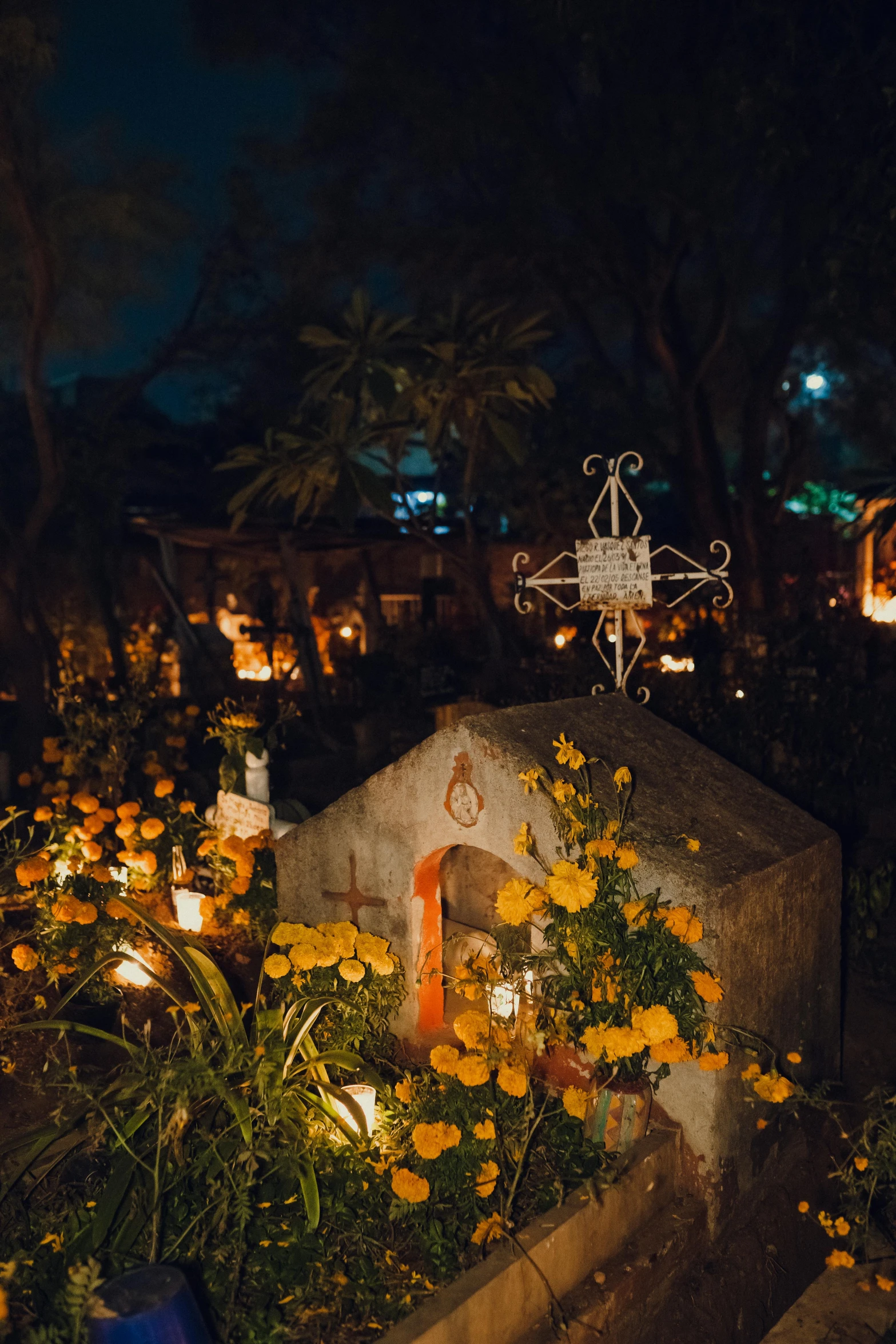 small chapel with flower pots in front of it