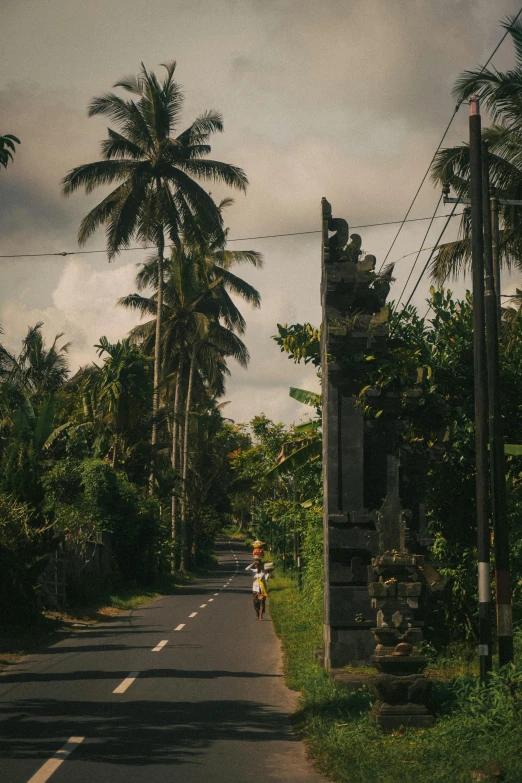 a person riding a motorcycle on a road