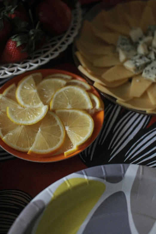 plates and food on a table for serving