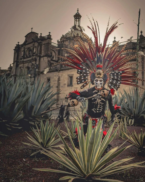 a man in a costume walking next to a building