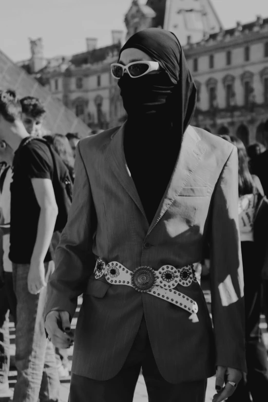 a black and white po of a person in costume