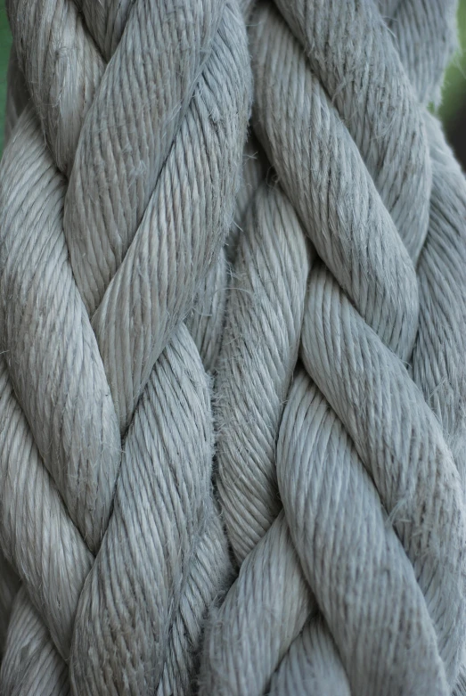 a closeup view of a skeing of gray yarn