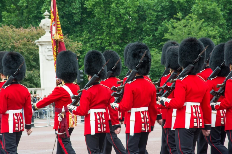 the changing colors of the royal guard at buckingham palace