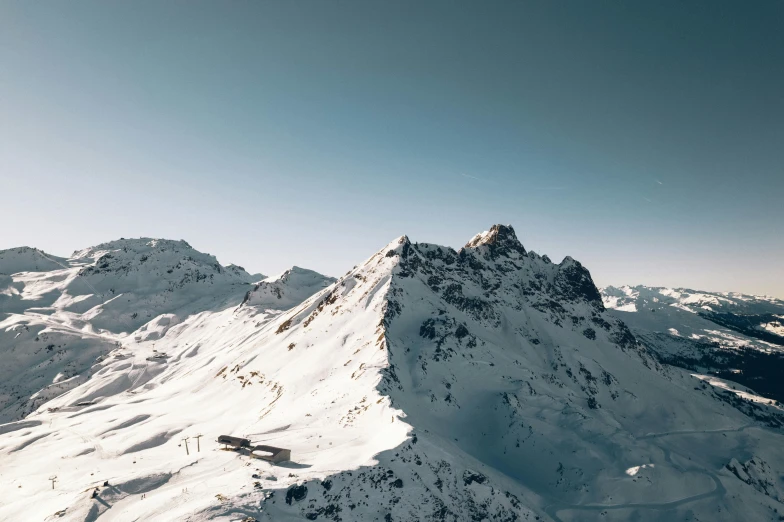 an empty ski slope in a mountainous area