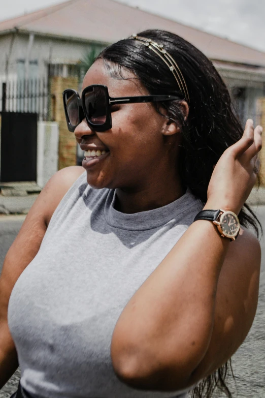 a woman is on a street talking to someone