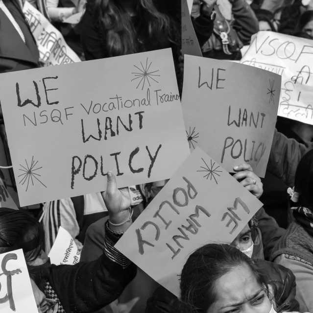 people are holding signs that read, we need you