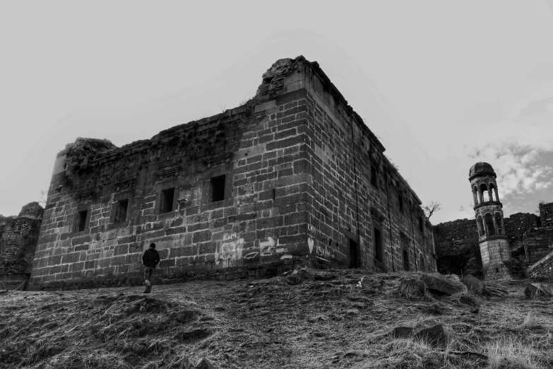 a stone building on top of a mountain